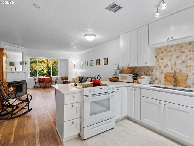 Photo - Bright & Inviting 2-Bed, 1.5-Bath with Modern Touches and Private Upstairs Retreat