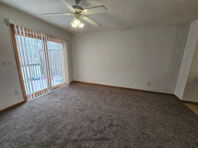Photo - 2 Bedroom 1.5 bath condo with attached garage in great NE location! Unit A