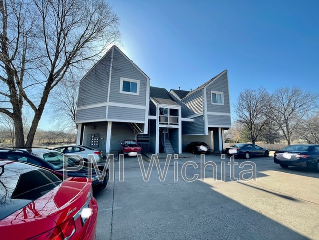 Building Photo - 3501 W 21st St N Unit 4