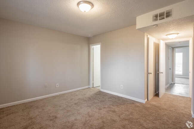 2BR, 1.5BA - 820SF - Primary Bedroom - Fountain Blue