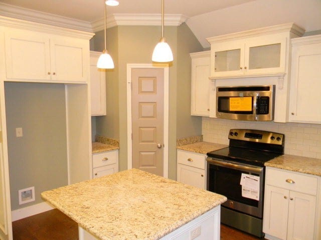 Photo - Modern 4BR Home with Open Layout, Granite Counters & Community Pool Access