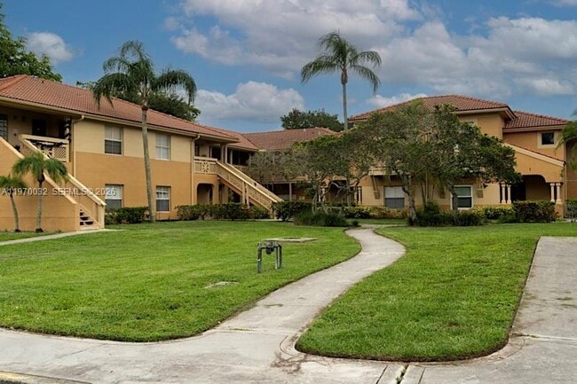 Building Photo - 4847 Via Palm Lakes Unit 1003