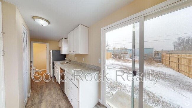 Building Photo - 2411 E St Vrain St Unit 102 Rental