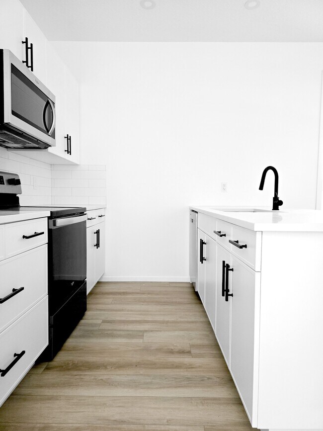 Photo - 11919-11955 55 St NW Unit MAIN 2