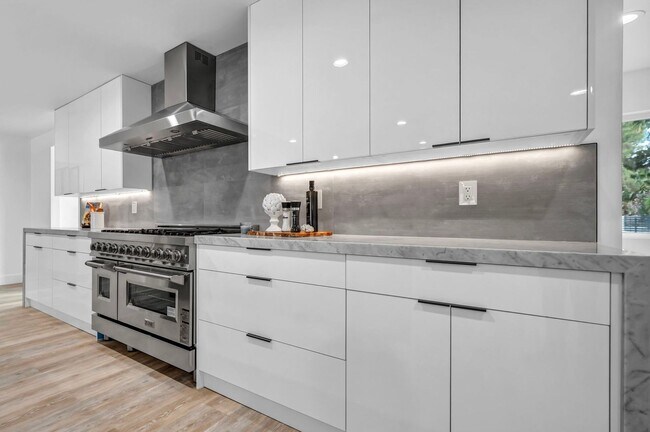 Photo - Meticulously renovated single-story contem...