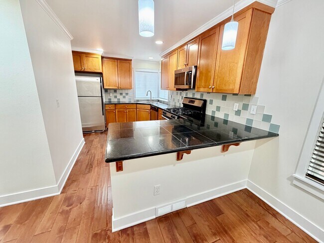 Photo - Urban Madison Valley three-bedroom townhome Available April 1st, 2026