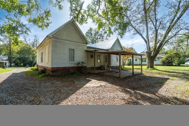 Photo - Talladega Beauty! Renovated 4BR/2BA with Huge Covered Porch