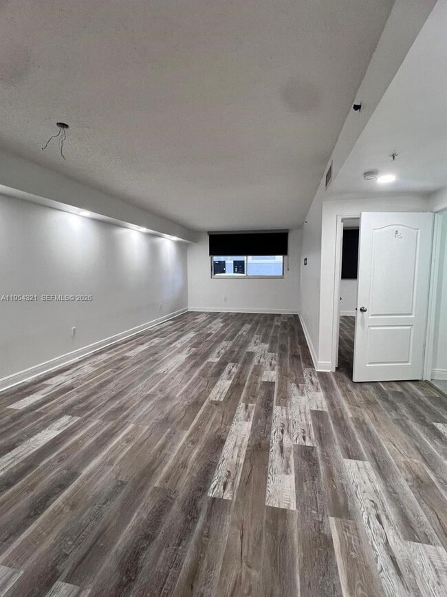 Building Photo - 5091 NW 7th St Unit 109