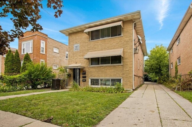 Building Photo - 1017 S 14th Ave Unit 1