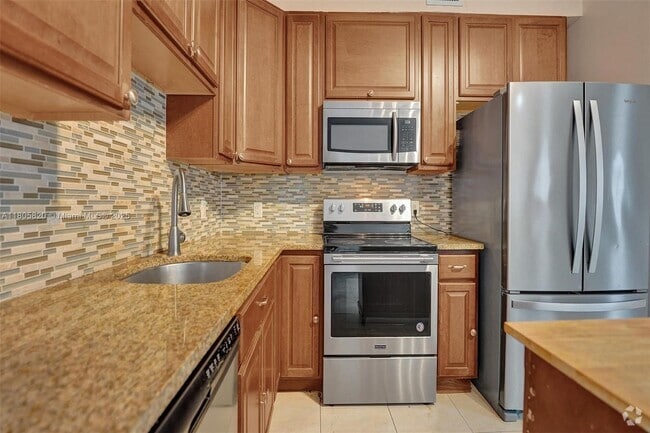 Building Photo - 1695 SW 11th St Unit 103 Rental