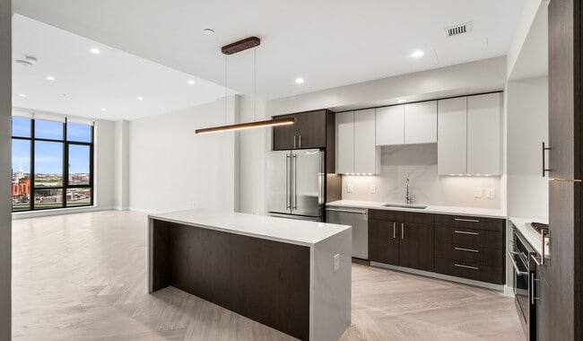 Upgraded penthouse units feature an open concept layout