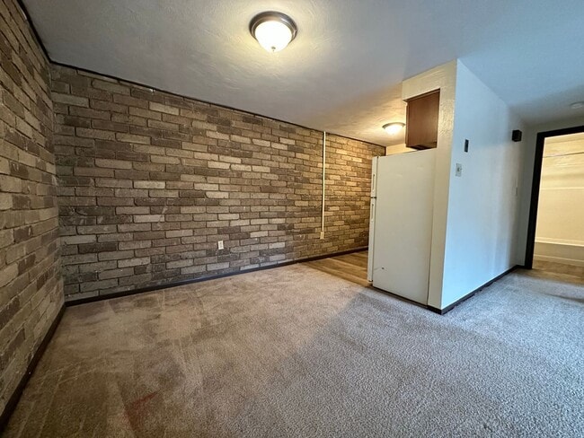 Photo - Amazing 1 Bedroom with Beautiful Exposed Brick! Off-Street Parking & Laundry Included! Unit 312
