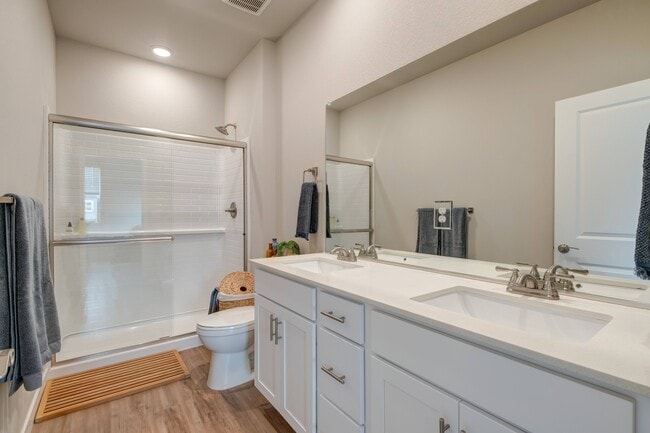 Dual-sink vanities in primary bathroom