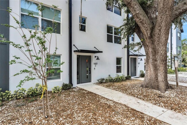 Building Photo - Available Now: 3-story townhome new constr...