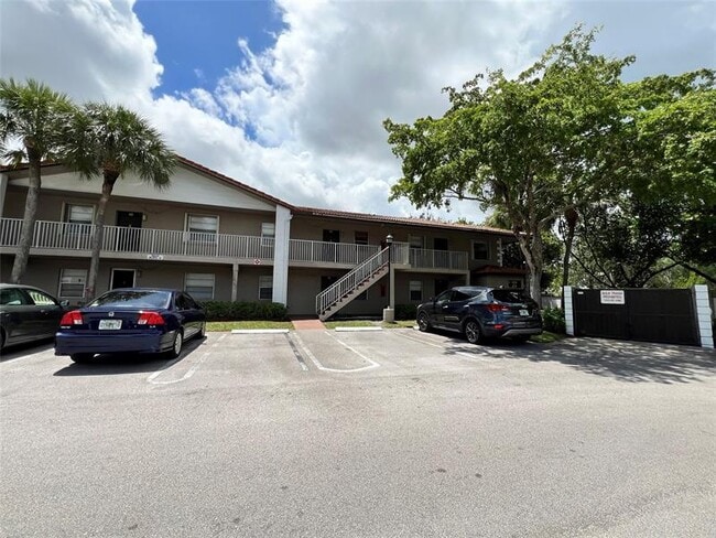 Building Photo - 8820 Royal Palm Blvd Unit 109-4 Rental