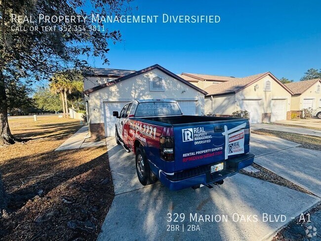 Building Photo - Charming 2/2 Town House With Garage