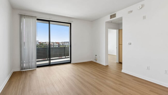 Living Room with Balcony and Hard Surface Flooring