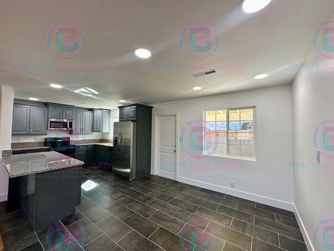 Photo - Modern 3-Bed Home with Fireplace, Backyard Entertaining Space & Prime Location