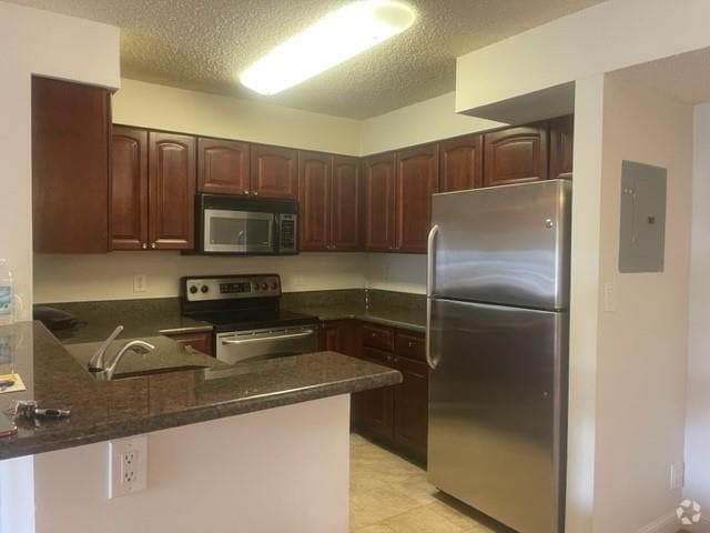 Building Photo - 7630 Westwood Dr Unit 306 Rental