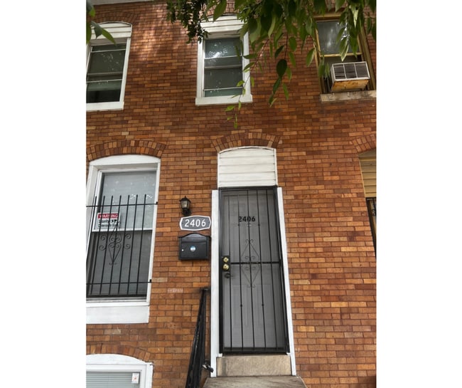 Building Photo - 2406 Wilkens Ave Unit 4 Available Priv. Bath $850