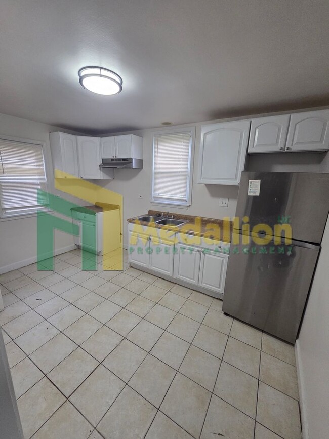 Photo - Updated 3-Bedroom Home with Spacious Layout and Backyard