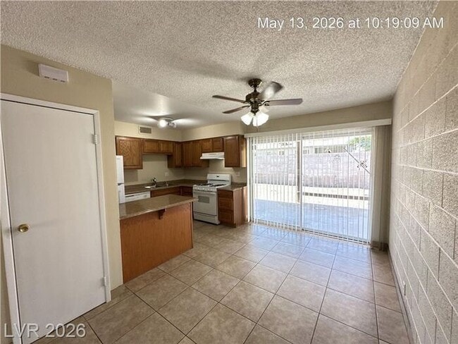 Photo - Cozy 4-Bedroom Home Near Las Vegas Strip with Large Yard & Covered Patio