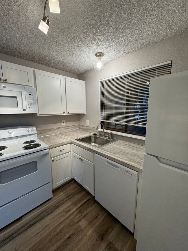 Photo - Fully Renovated 2 bedroom, 1.5 bath Apartment with New Appliances and Separate Garage!  Fully Rem...