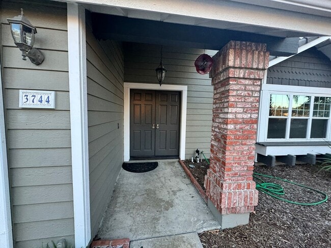 Photo - Elegant 4-Bed, 3-Bath Two-Story Home with Spacious Backyard and Private Downstairs Suite