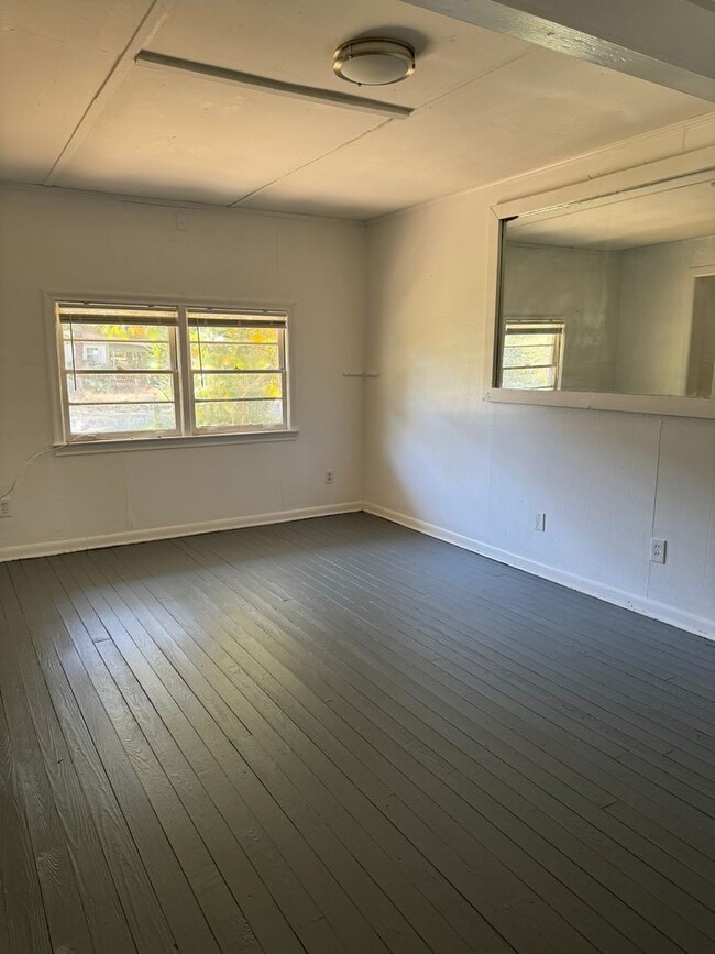 Photo - 3 bedroom 1 bath house with a large back yard! Available August 2026