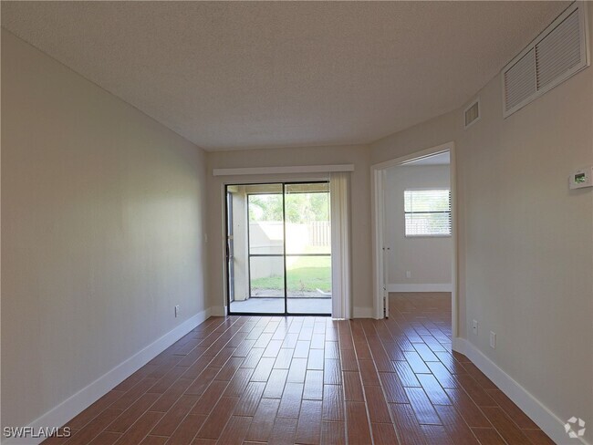 Building Photo - 5303 Summerlin Rd Unit 301 Rental