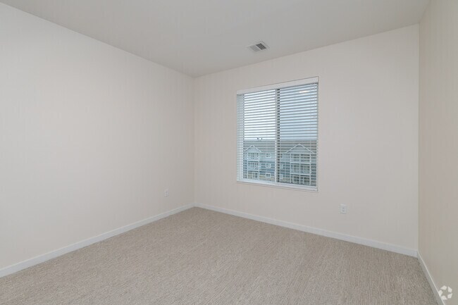 2BR, 2BA - 1,192SF - Primary Bedroom