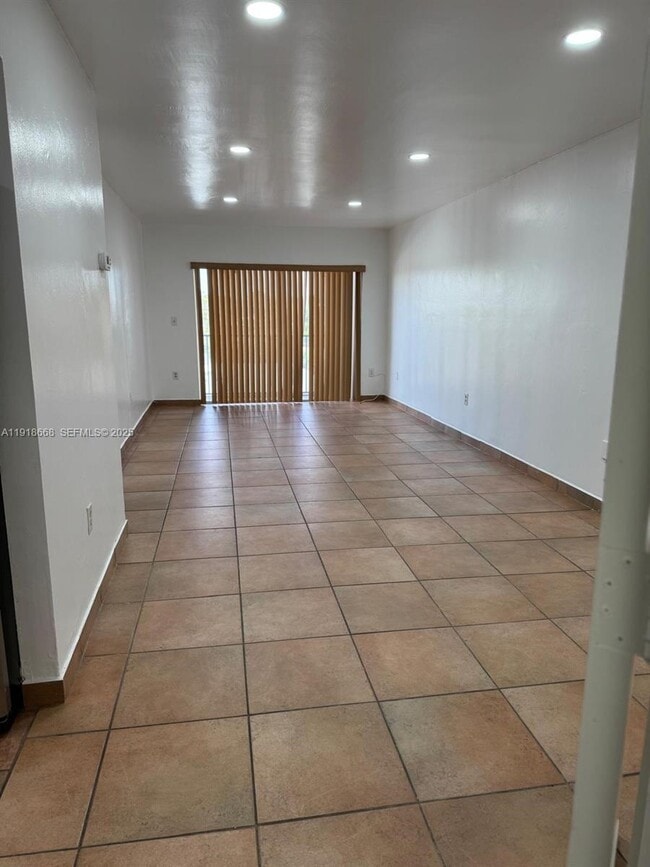 Building Photo - 5731 NW 37th St Unit 407