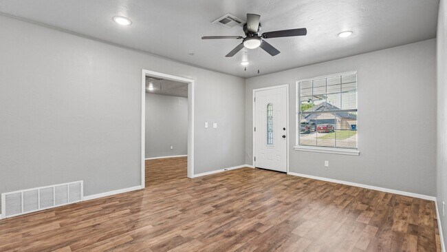 Photo - Charming 3 Bedroom Home with Spacious Backyard