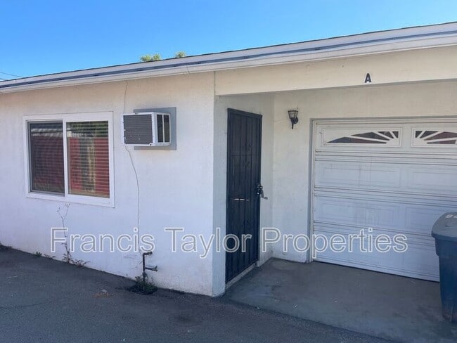 Building Photo - 806 W 15th Ave Unit A Rental
