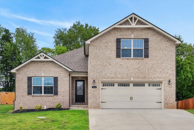 Building Photo - Like New Three Bedroom with Bonus!