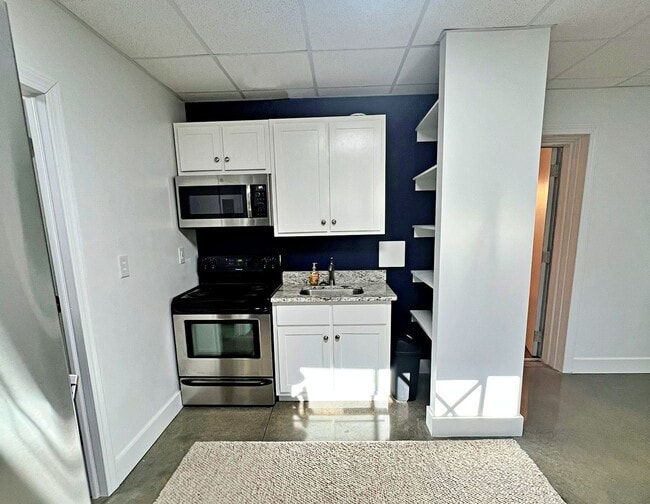 Photo - Furnished 1BR Apartment in Industrial Area | Easy I-64 Access | Truck Parking Available