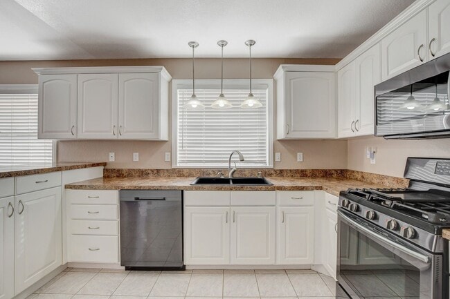 Photo - Spacious 4-Bedroom Home in Prime Location!