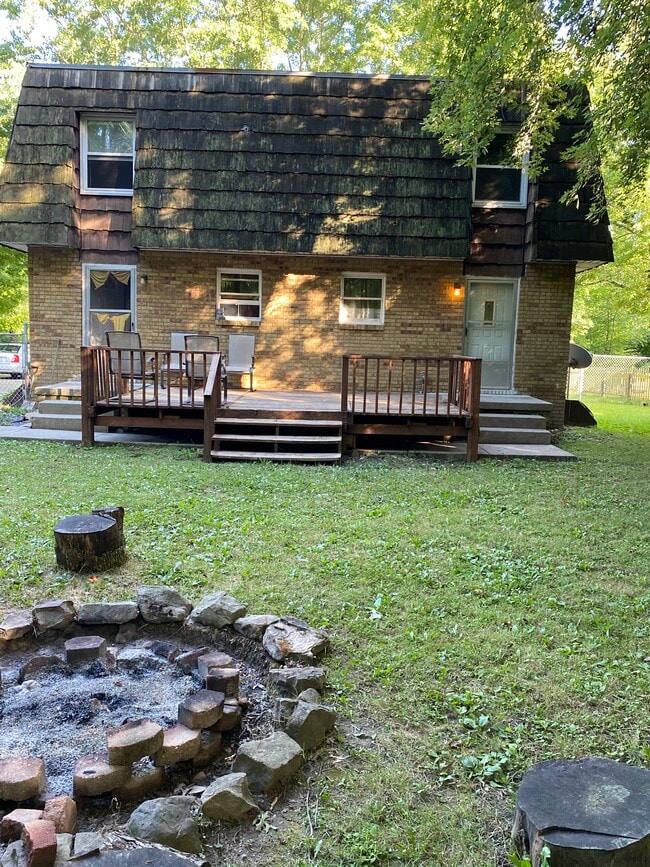 Rear deck and fire pit - 1385 Emmet St Unit 1385