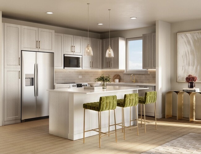 Open-concept apartment homes with chef's island, streamlined kitchen, and connected living areas designed for everyday flow and flexibility. - Modera Walsh Heights