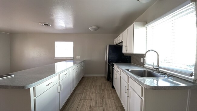 Building Photo - 8113 W 10th Ave Unit 8113