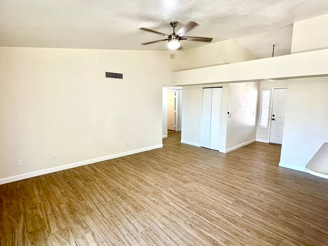 Photo - Beautifully updated Mesa home near Whitman Park with wood-look tile, fresh paint, vaulted ceiling...