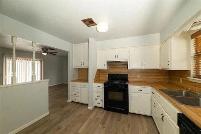 Photo - Charming 3-Bedroom Home with a Massive, Fenced Backyard!