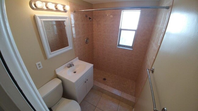 Photo - Large 2/2/1 1060 sq ft home with INDOOR LAUNDRY, a full garage, updated kitchen and a fenced in y...