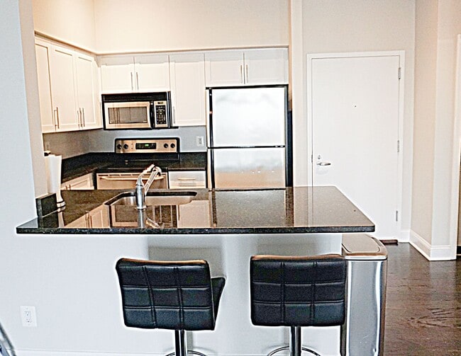 Photo - A Modern Living of Top-Level Unit in the Chase in Bethesda