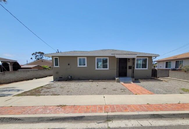 Building Photo - Spacious Home in Linda Vista with Modern A...