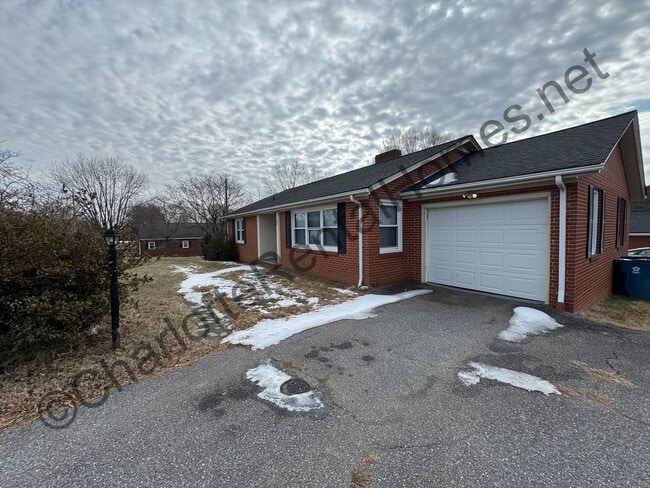 Photo - Brick ranch with brick workshop