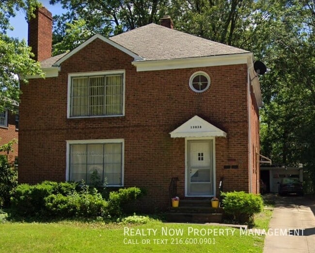 Building Photo - 13838 Cedar Rd Unit 13838CedarDN