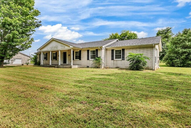 Photo - spacious 4-bedroom, 2.5-bath home featuring a 2-car garage and fresh updates throughout.