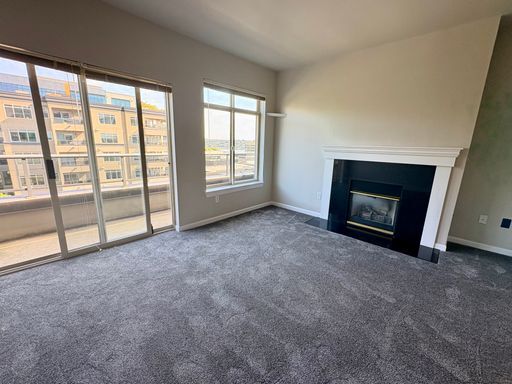 Photo - Top-Floor Corner 2BR with Lake Union Views + Garage Parking Included!