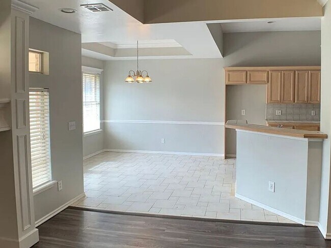 Photo - Spacious 4-Bedroom Home | Fenced Yard & 2-Car Garage